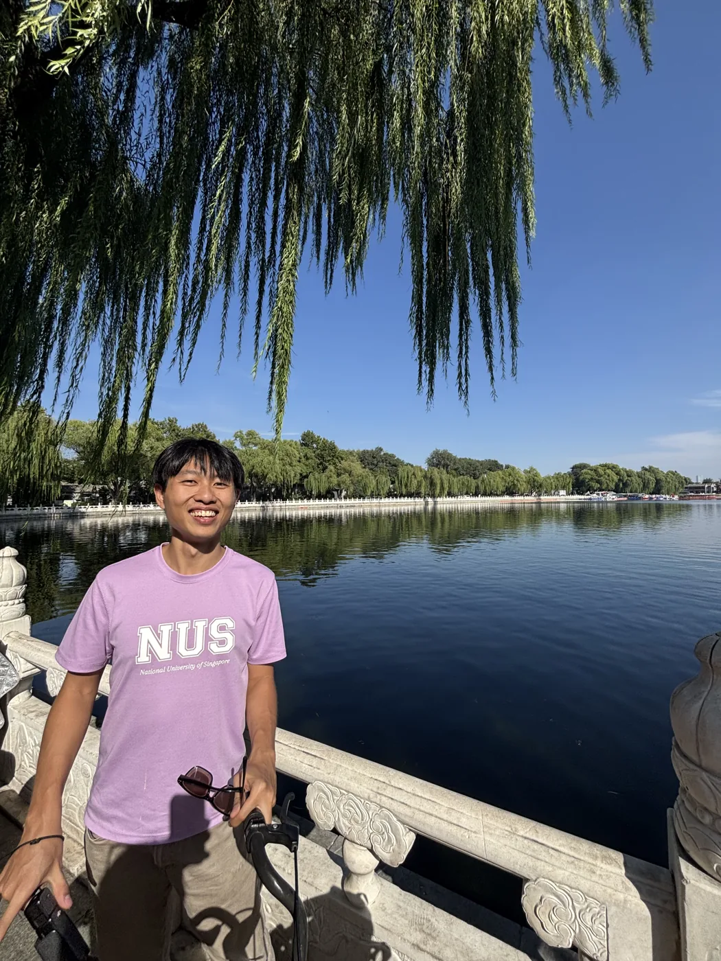 Standing by Houhai Lake with willows, Beijing