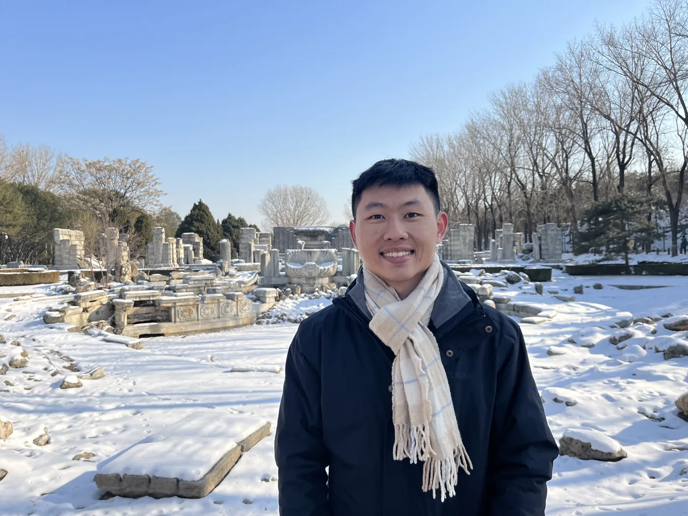 Standing in snow at the Old Summer Palace ruins, Yuanmingyuan, Beijing