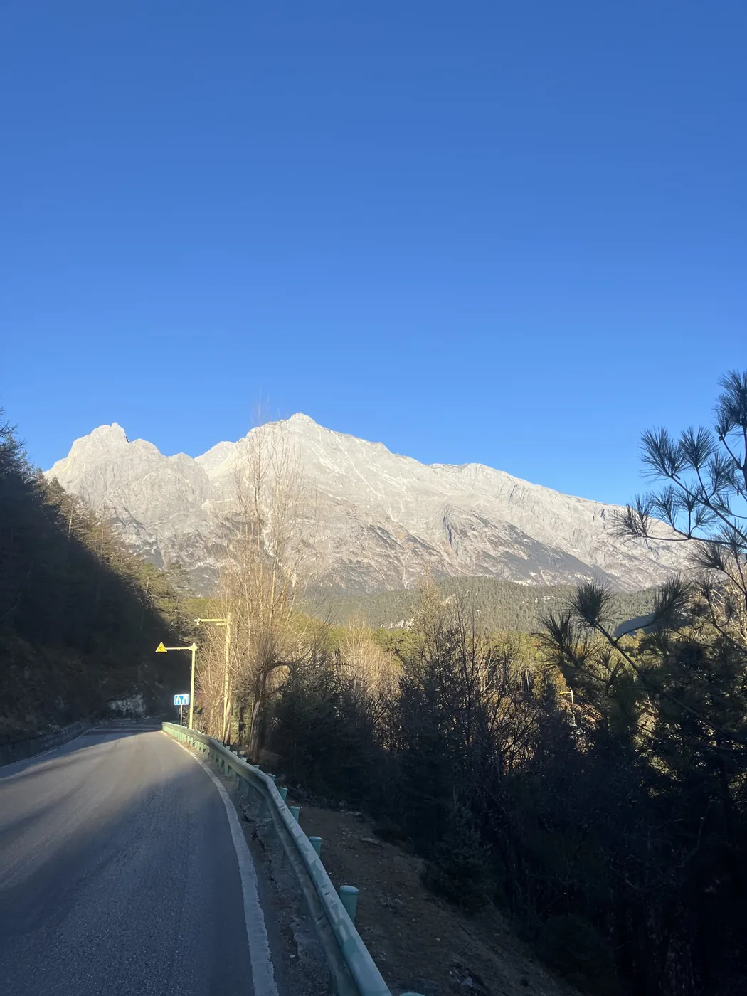 Mountain road below Jade Dragon Snow Mountain, Lijiang, Yunnan, China
