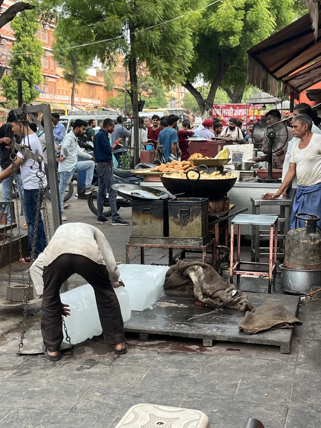 Street food stalls frying kachoris in Jaipur bazaar