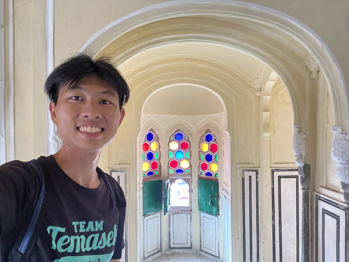 Selfie inside Hawa Mahal with stained glass honeycomb windows, Jaipur