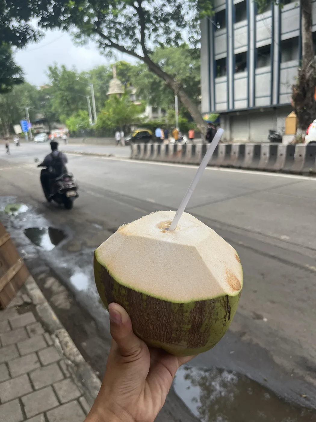 Fresh coconut water on a rainy Mumbai street