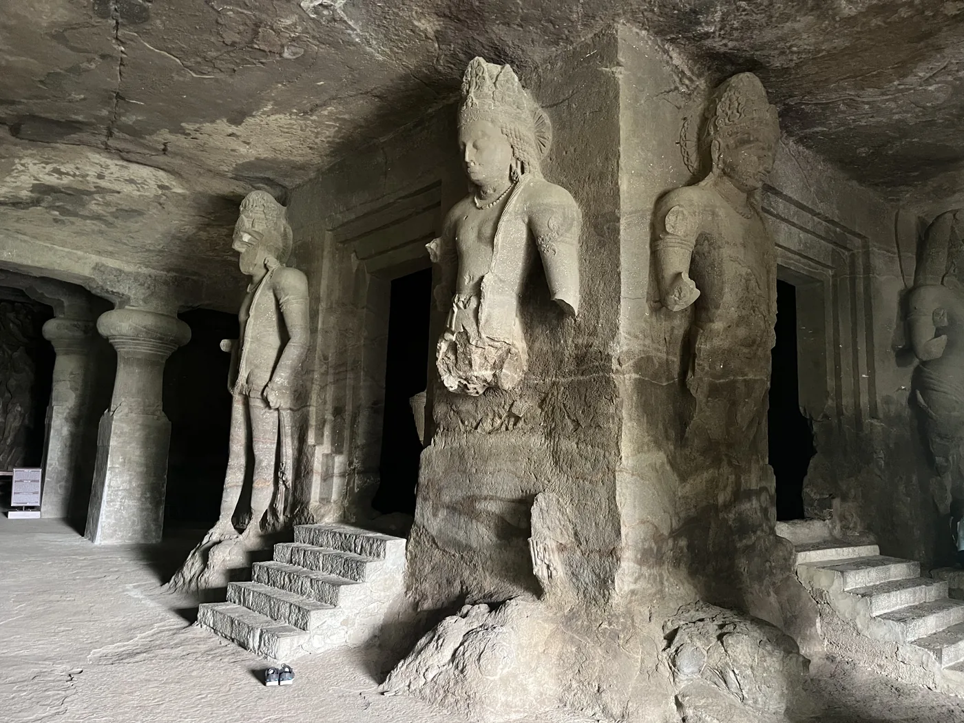Rock-cut Shiva guardian figures inside Elephanta Caves, Mumbai