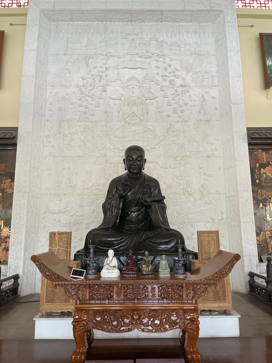 Bronze statue of Xuanzang inside the memorial hall, Nalanda