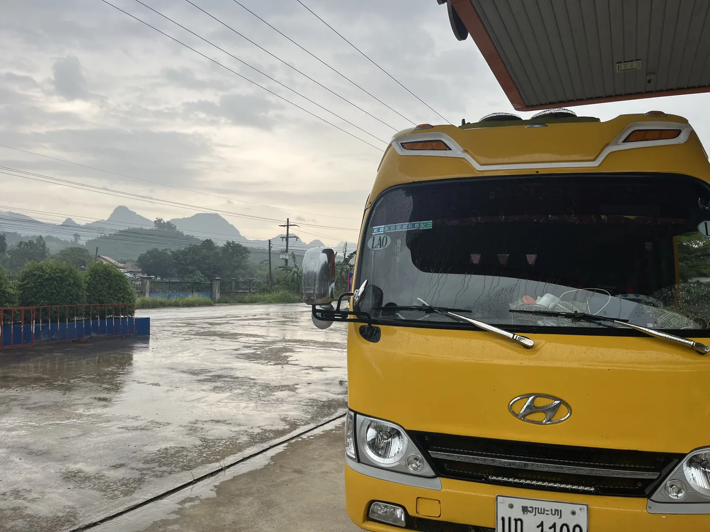 Overland bus stop in the Laos mountains