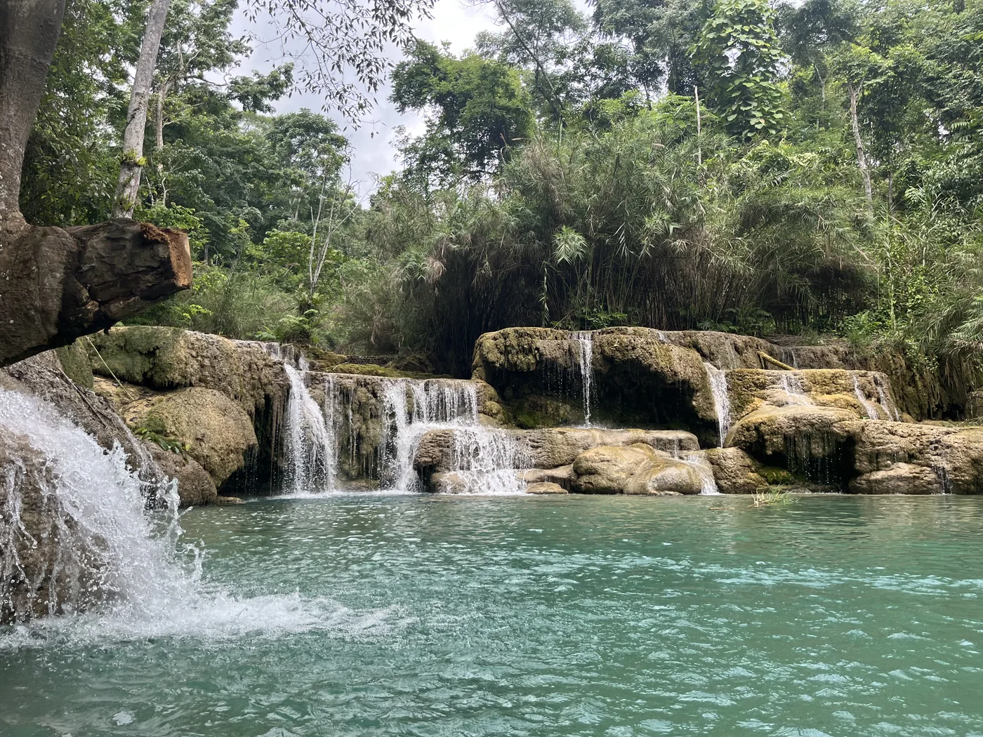 Kuang Si Waterfall cascading over limestone terraces, Laos