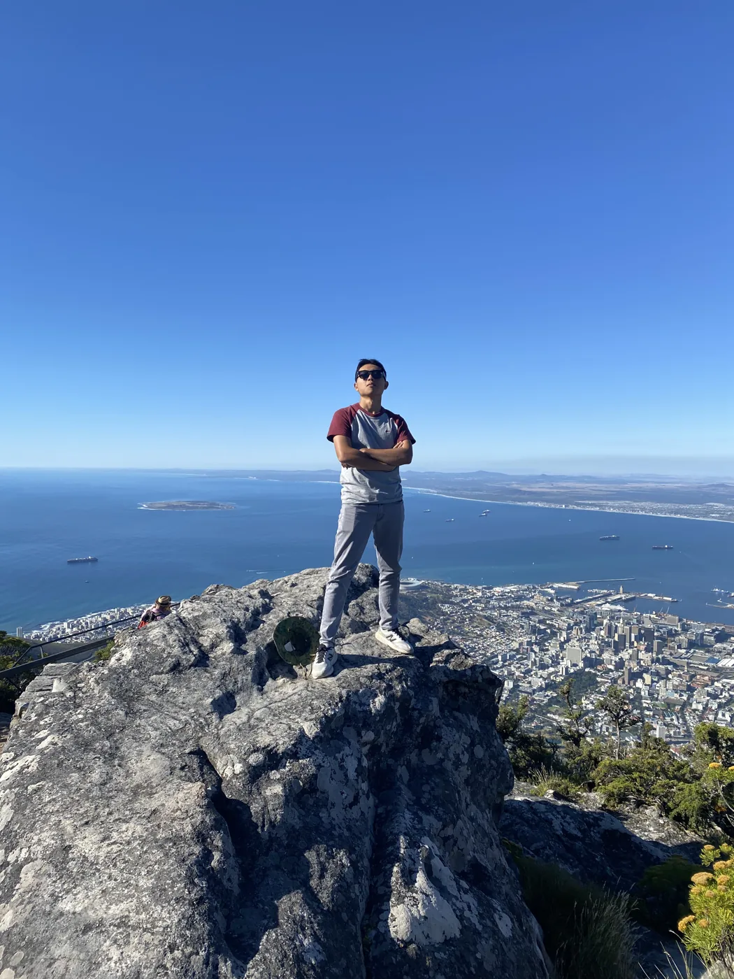 Standing on top of Table Mountain with Cape Town and the ocean sprawling below