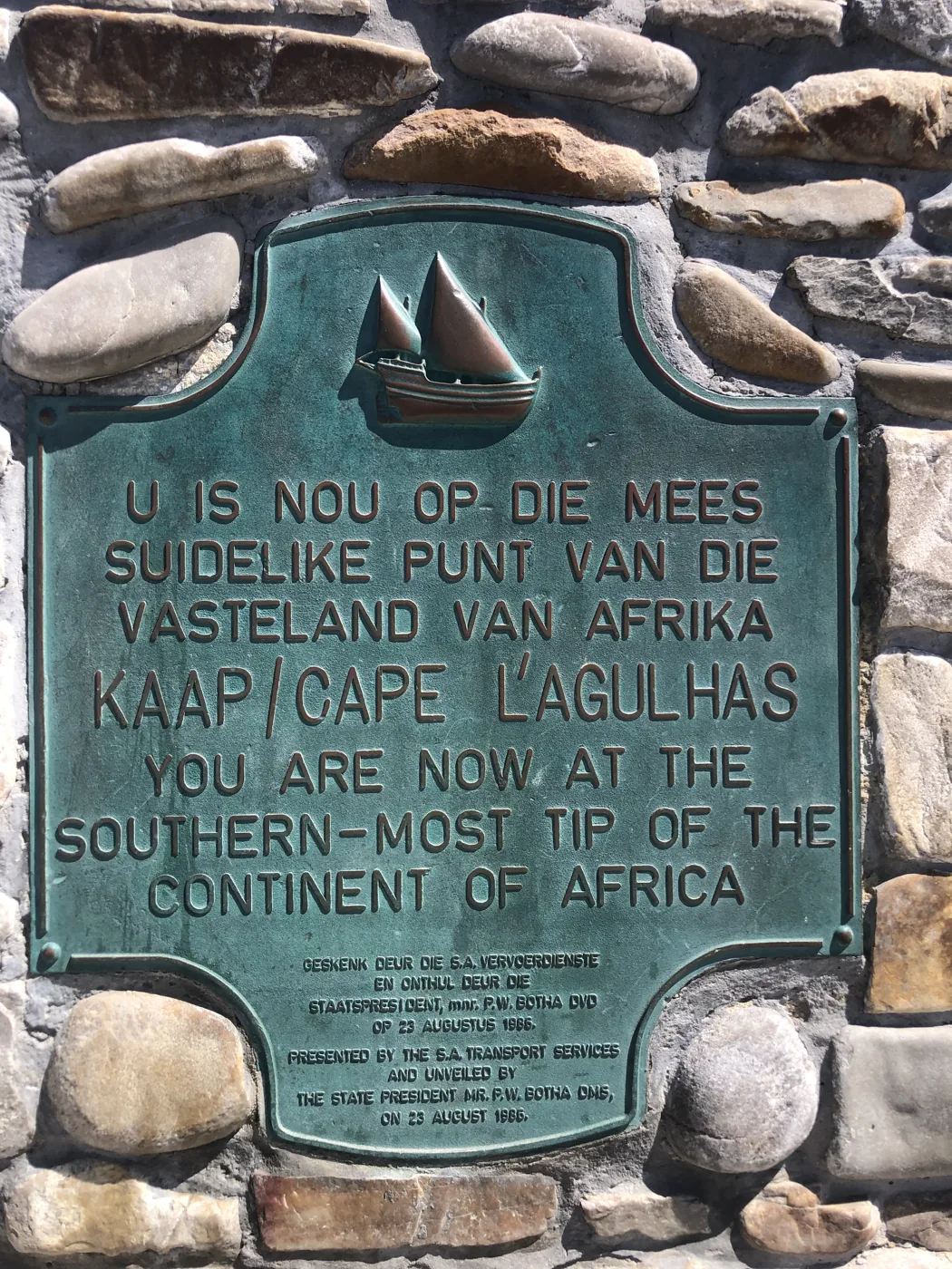 Bronze plaque marking Cape Agulhas as the southernmost tip of the continent of Africa