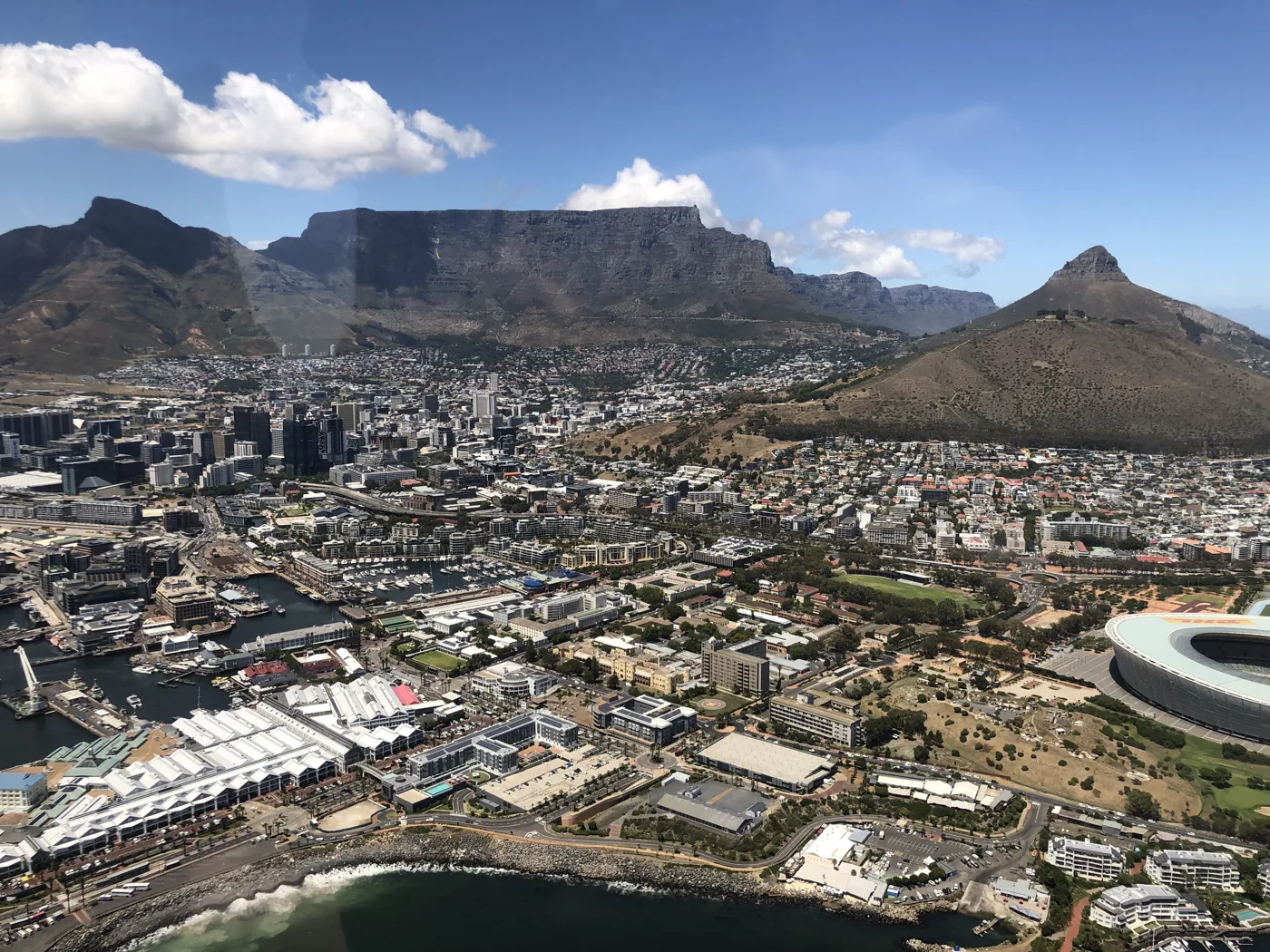 Aerial view of Cape Town with Table Mountain, Lion's Head, and the V&A Waterfront