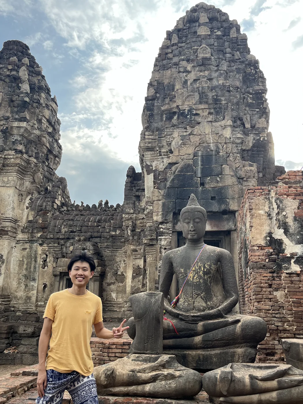 Standing with stone Buddha, Sukhothai