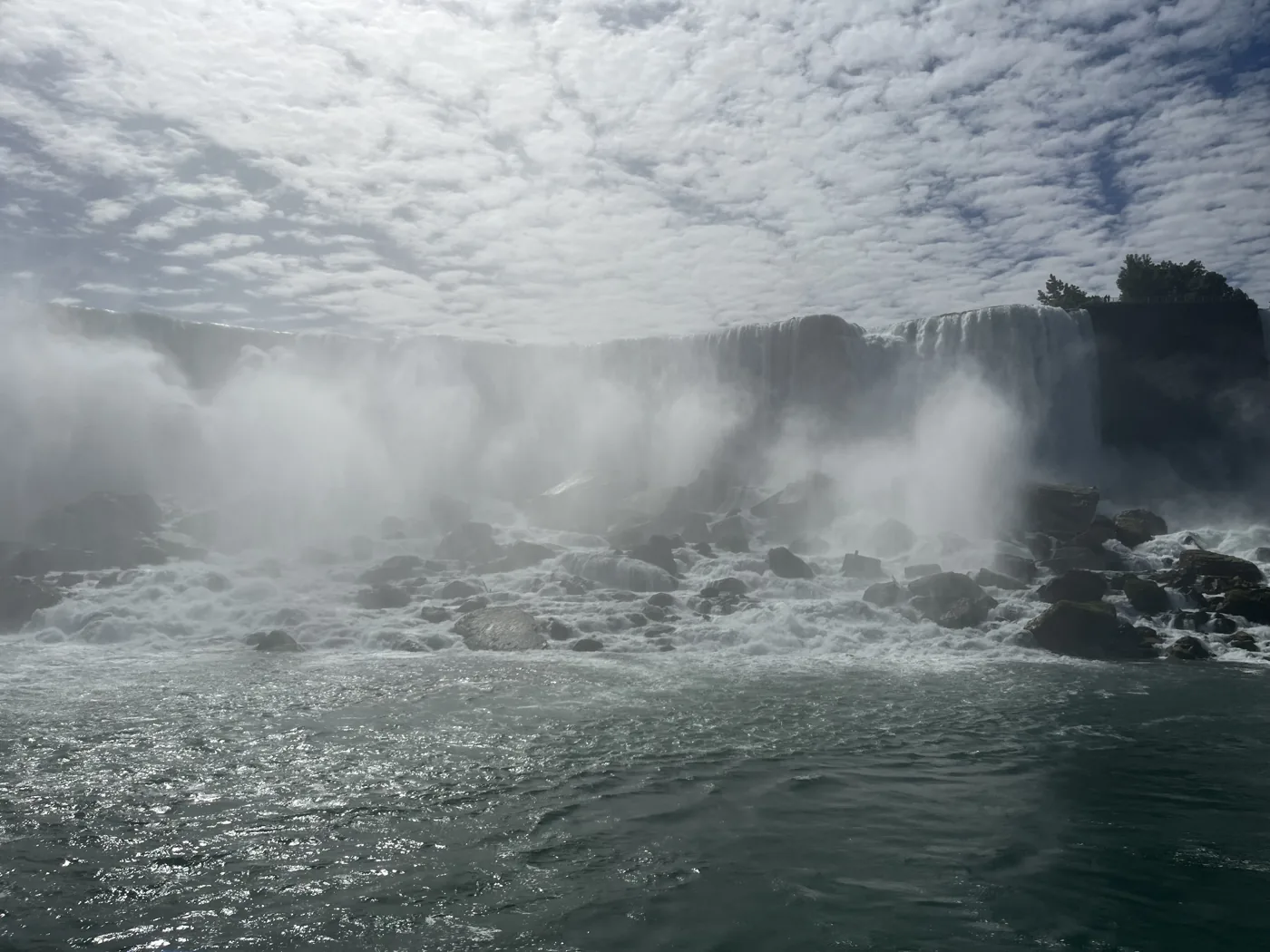 Niagara Falls American side from the water, mist and rocks