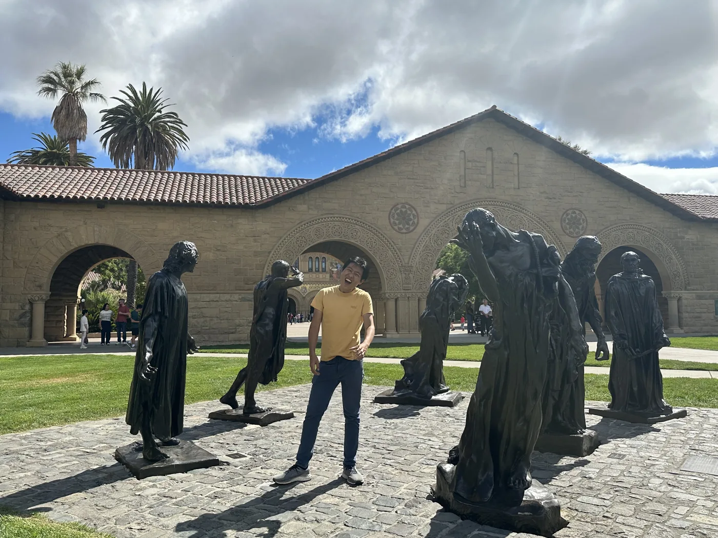 Standing among Rodin's Burghers of Calais statues at Stanford