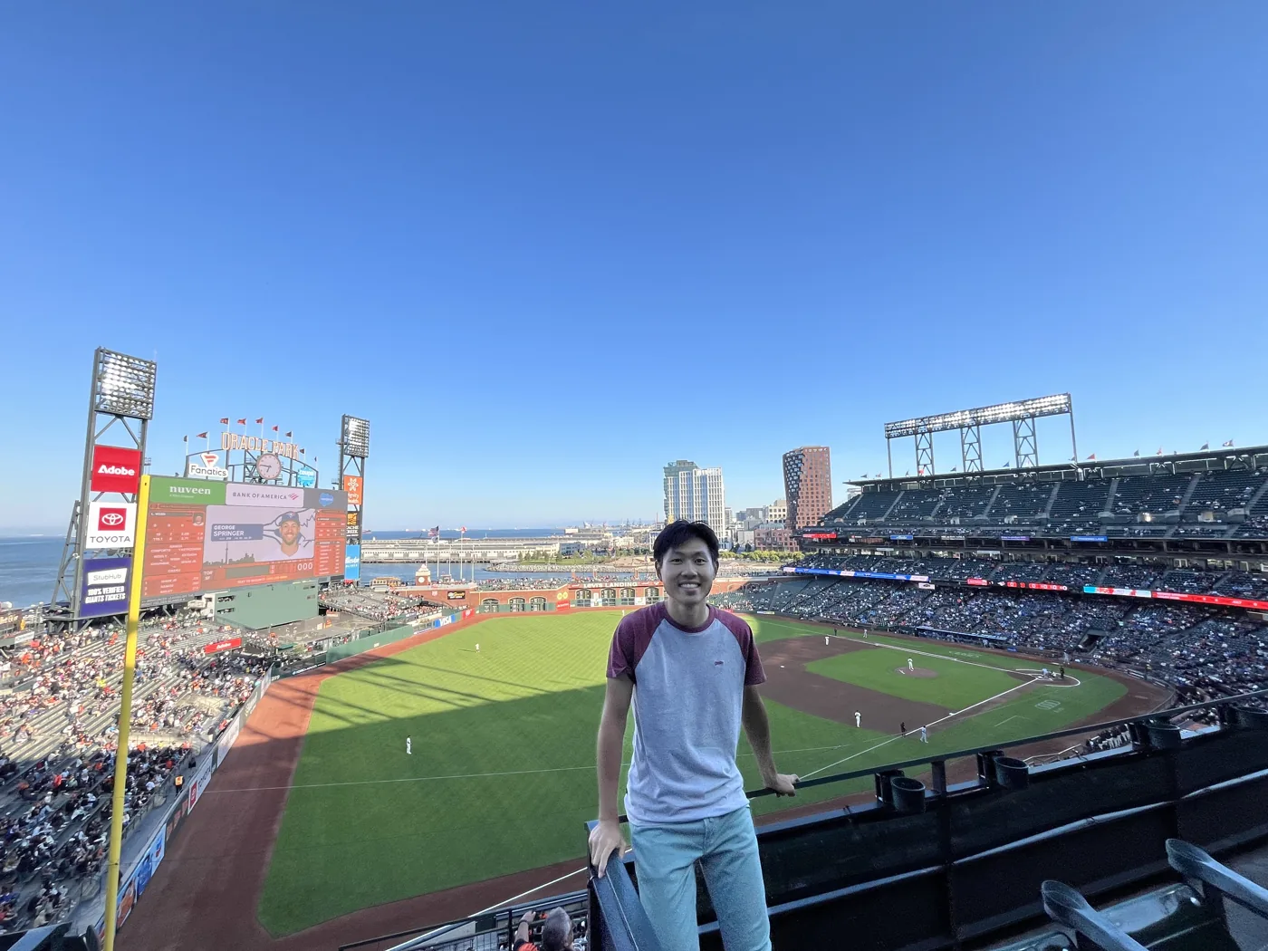 Standing at Oracle Park SF Giants game with bay view