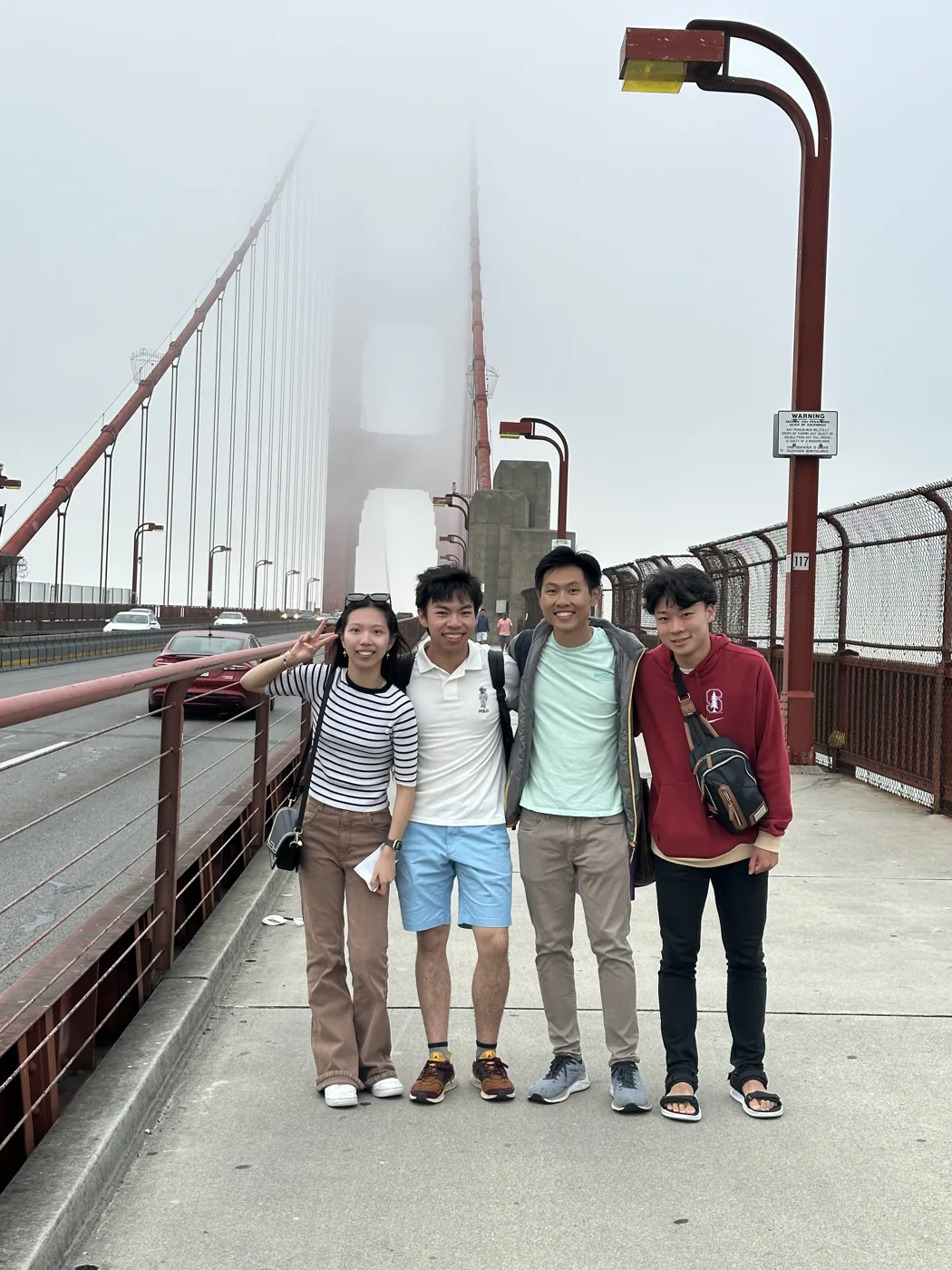 Group photo on Golden Gate Bridge in thick fog