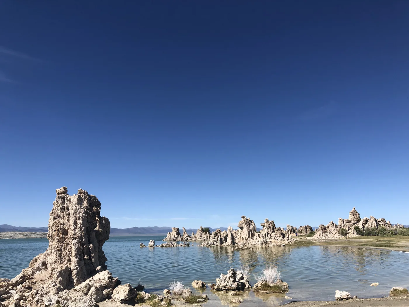 Mono Lake tufa towers rising from still blue water